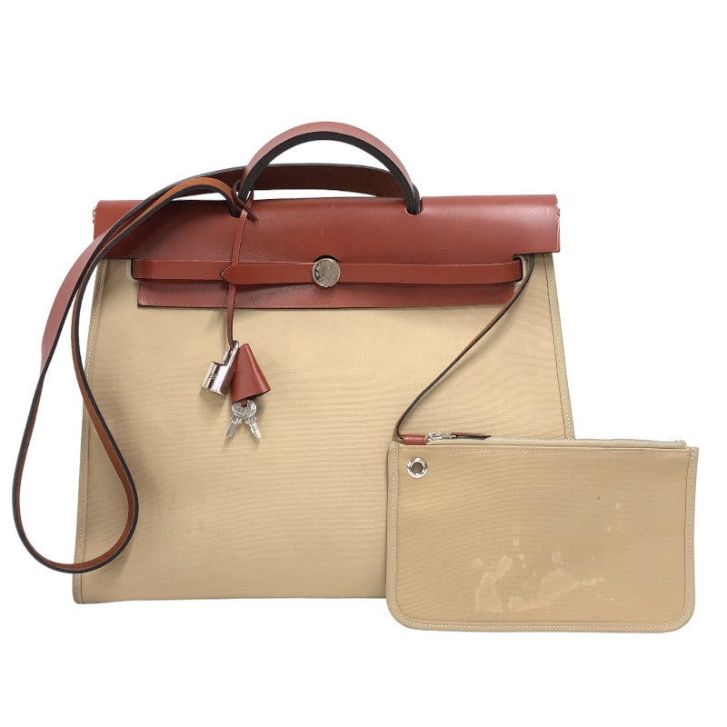エルメス HERMES エールバッグジップMM X刻 ベージュ シルバー