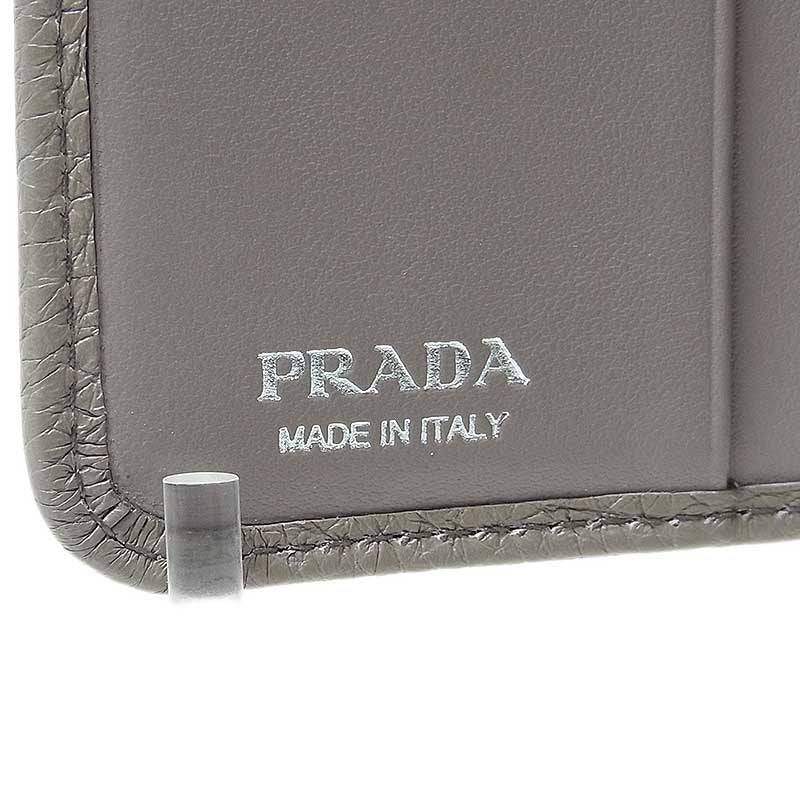 プラダ PRADA ファスナーポケット付き2つ折財布 1ML018 グレージュ ...