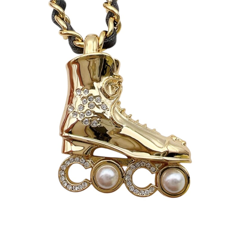 シャネル CHANEL ローラースケート　ネックレス ゴールド/ブラック メタル/レザー アクセサリー