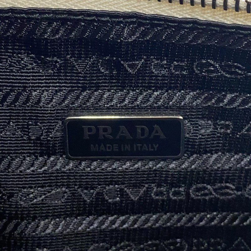プラダ PRADA トライアングルポーチ 1NE039 アイボリー ナッパレザー レディース クラッチバッグ
