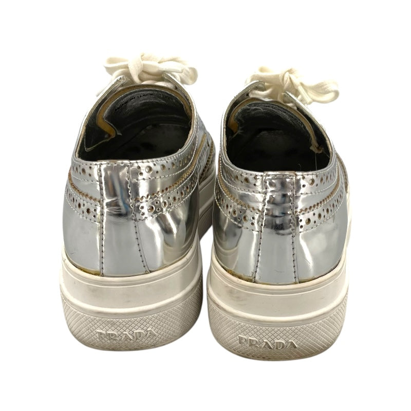 プラダ PRADA ウィングチップ ローカットスニーカー シルバー レディース スニーカー