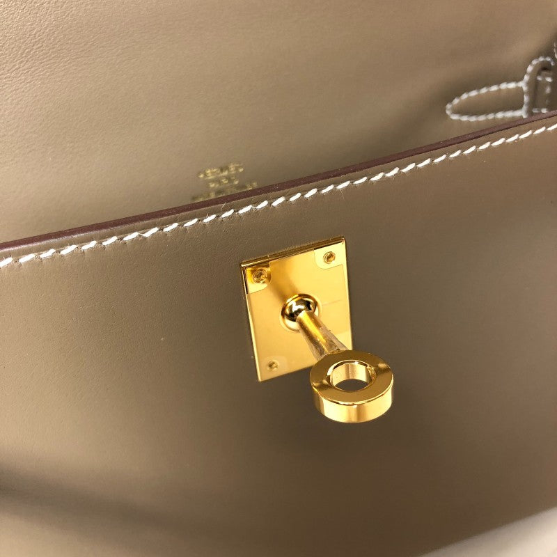 エルメス HERMES ポシェットケリー Ｗ刻 エトゥープ ゴールド金具 スイフト レディース ハンドバッグ