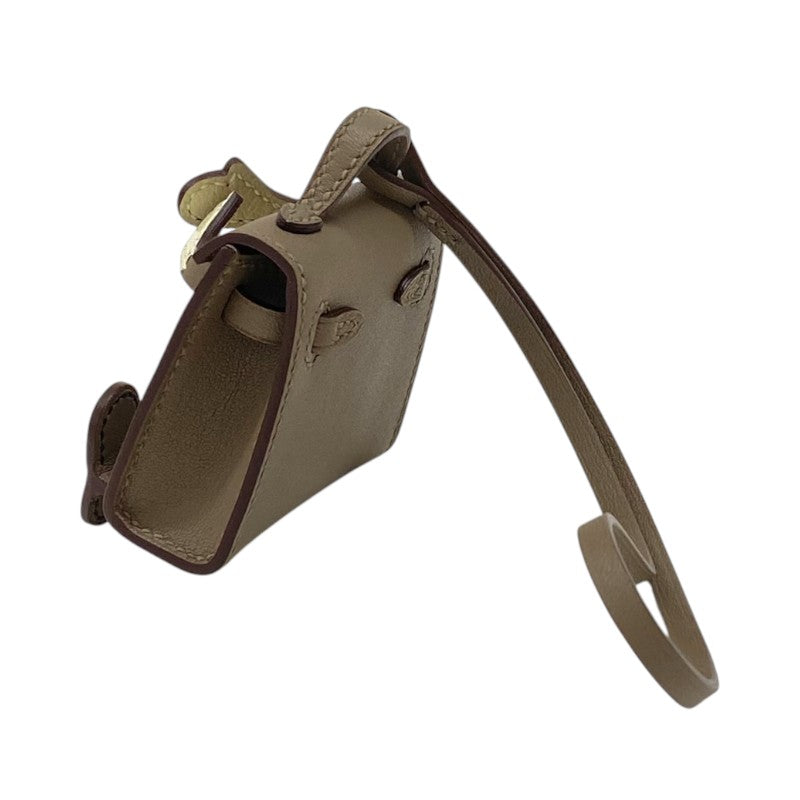 エルメス HERMES ケリードールチャーム U刻 エトゥープ×ナタ×ブラック ゴールド金具 タデラクト ユニセックス バッグチャーム