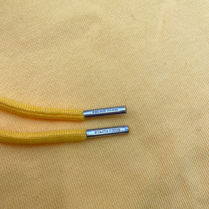 セリーヌ CELINE スタッズロゴプルオーバーパーカー 2Y695670Q イエロー 綿 メンズ パーカー