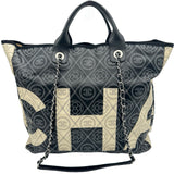 シャネル CHANEL カメリアラージショッピングバッグ A57161 25番台 ブラック/アイボリー シルバー金具 PVC レディース トートバッグ