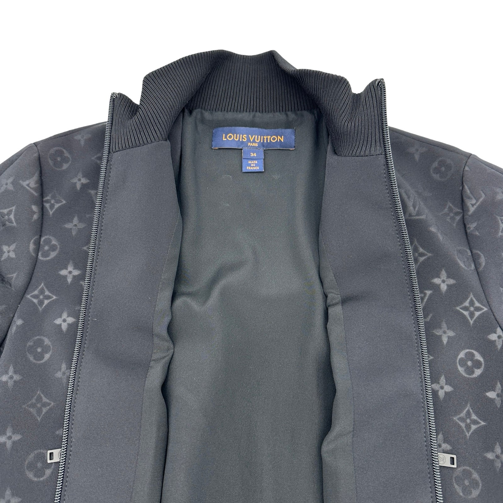 ルイ・ヴィトン LOUIS VUITTON エンボスモノグラムトラックトップ
