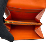 エルメス HERMES コンスタンス コンパクト A刻印（2017年製) オレンジ　ゴールド金具 オーストリッチ レディース 二つ折り財布