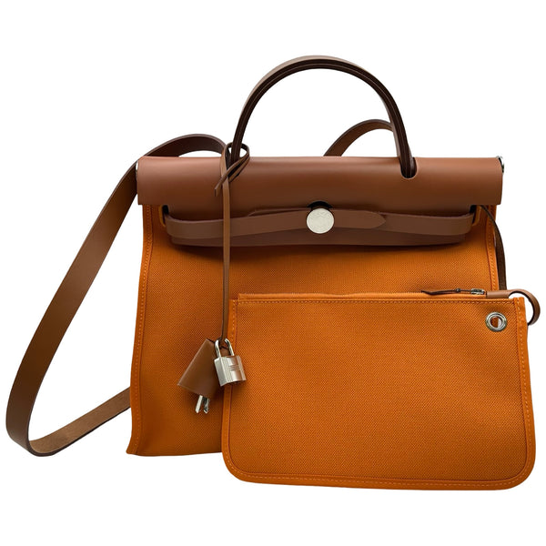 30日迄価格　新品フィルム付き　エルメス　hermes カデナ　ゴールドシルバー エルメス HERMES エールバッグジップPM C刻印 オレンジ系/ナチュラル