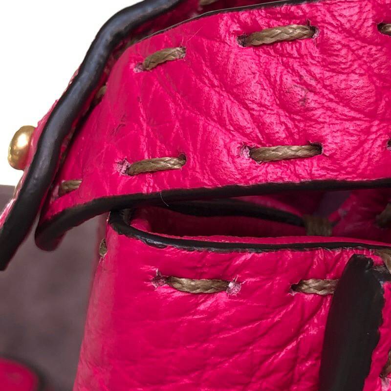 セレリア素材　ピンク　ピーカーブー型本革バッグ